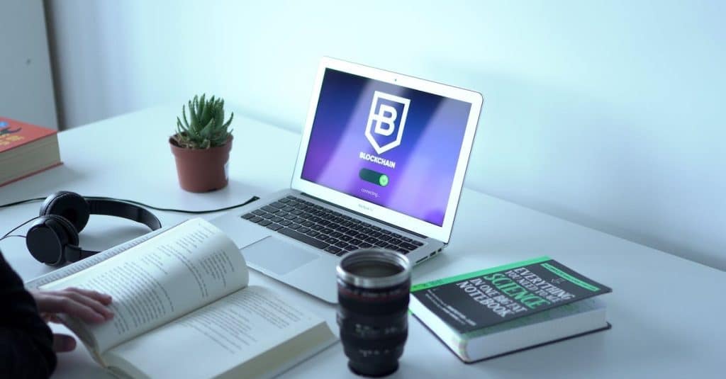 a-laptop-and-books-on-a-table